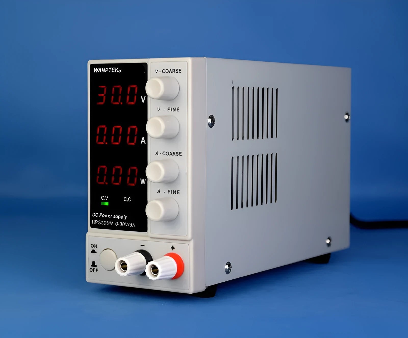 White adjustable DC bench power supply unit with displays and controls for voltage and current.