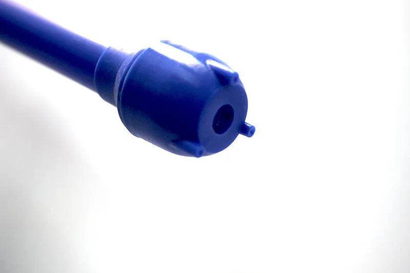 Blue and red manual hand siphon pump for transferring gasoline and liquids.
