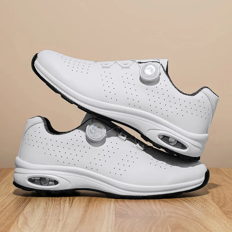 Women's low-top black mesh casual sneakers with white composite sole and lace-up closure.