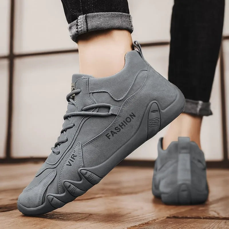 Men's grey low-top casual work shoes with non-slip sole and elastic band