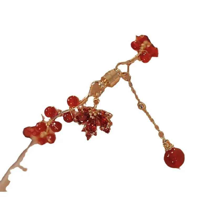 Red Chinese style magnetic bracelet with ginkgo leaf design and electroplated finish