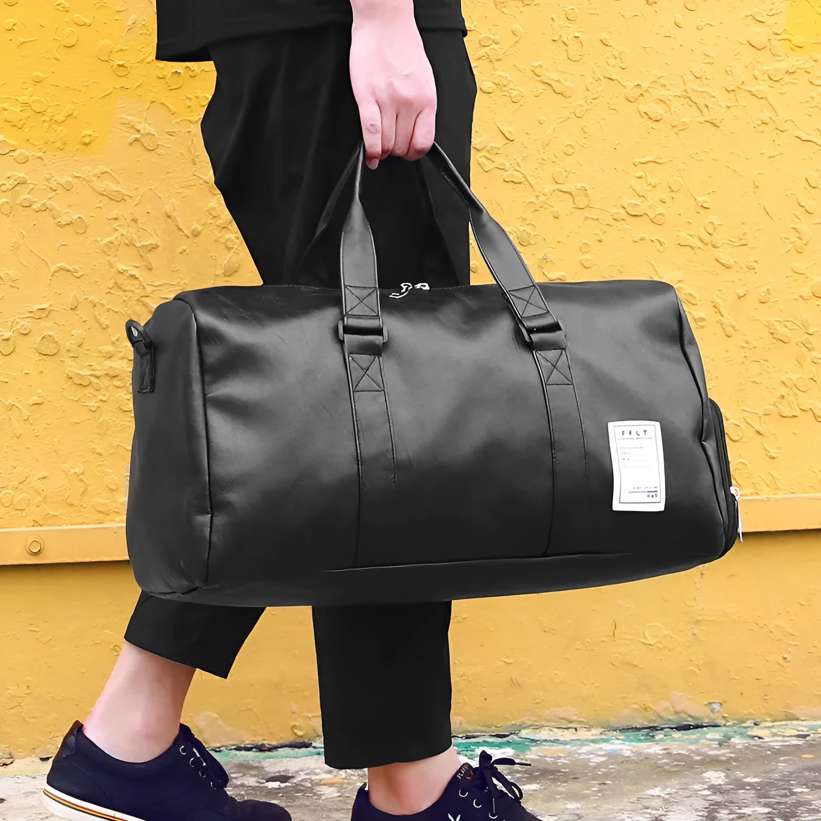 Black waterproof sports fitness bag with separate shoe compartment and diagonal strap.