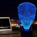 USB-powered 3D LED lamp showing multiple colours on an acrylic panel with a remote control.