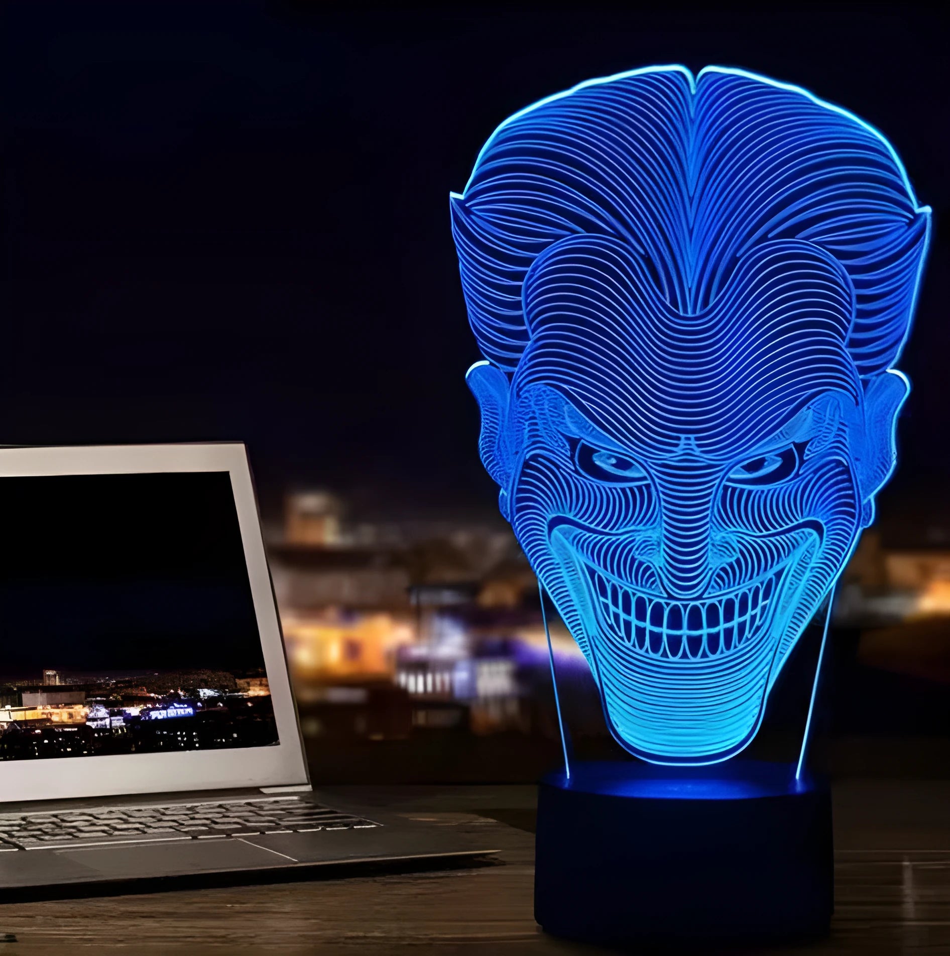 USB-powered 3D LED lamp showing multiple colours on an acrylic panel with a remote control.