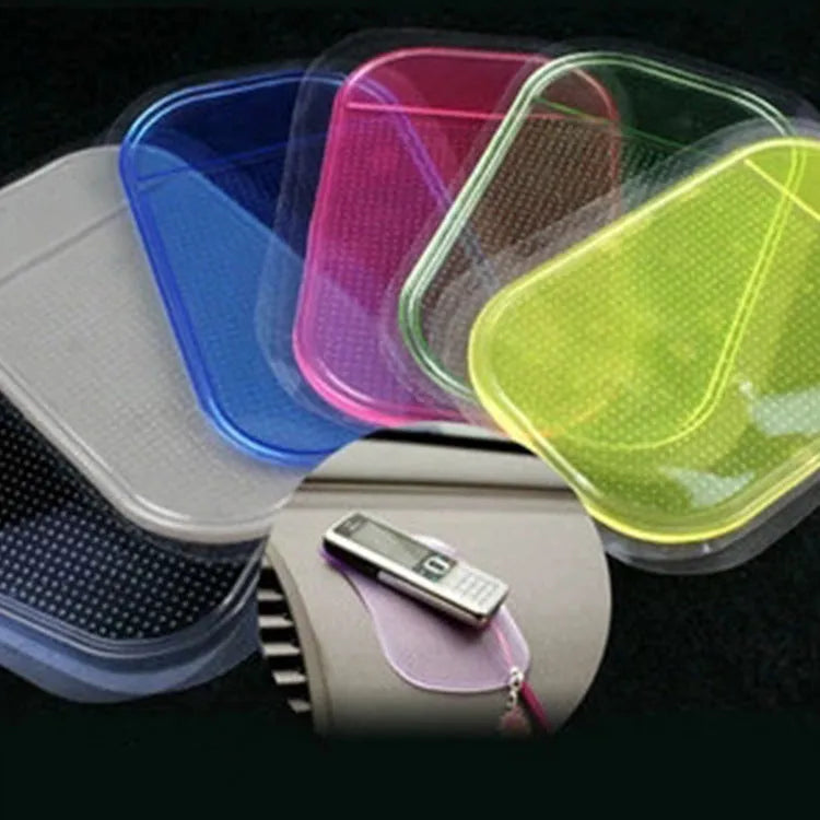 Black silicone spider anti slip mat for car dashboard measuring 13 by 7 centimetres