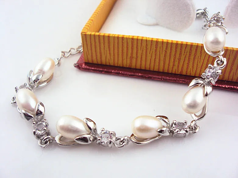 Freshwater pearl bracelet with Korean crown design alloy closure on display