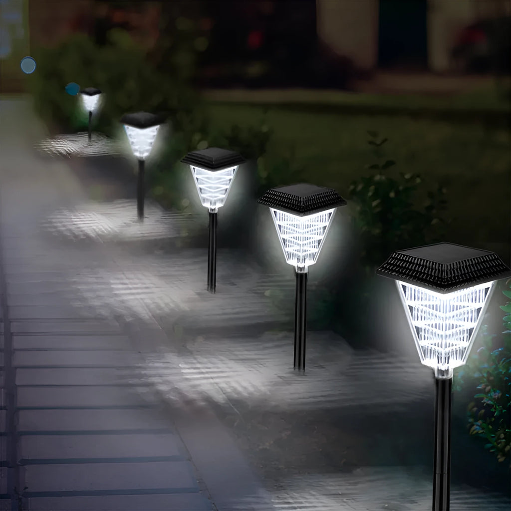 Solar garden light with LED bulbs in decorative outdoor setting showing colour options