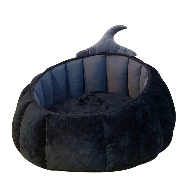 Orange Halloween pumpkin-shaped soft plush cat bed with a cartoon devil face design.