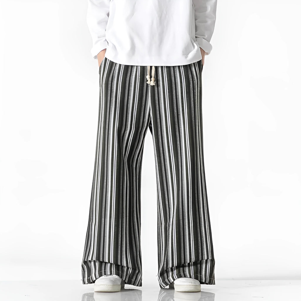 Man wearing vintage stripe loose straight leg cotton blend mopping pants in khaki colour.