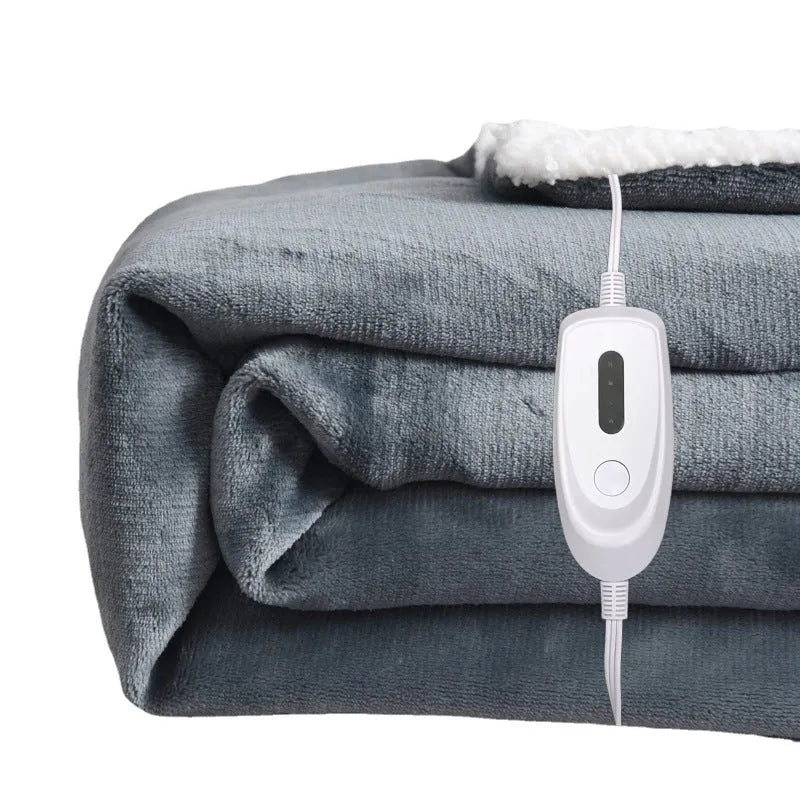 Grey and white USB-powered flannel electric heating blanket laid flat.