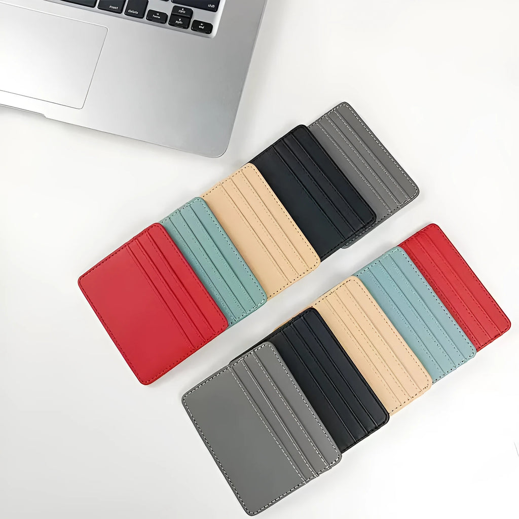 Compact leather cutting ferrule with multiple card slots in black, showing the front exterior and card storage capacity