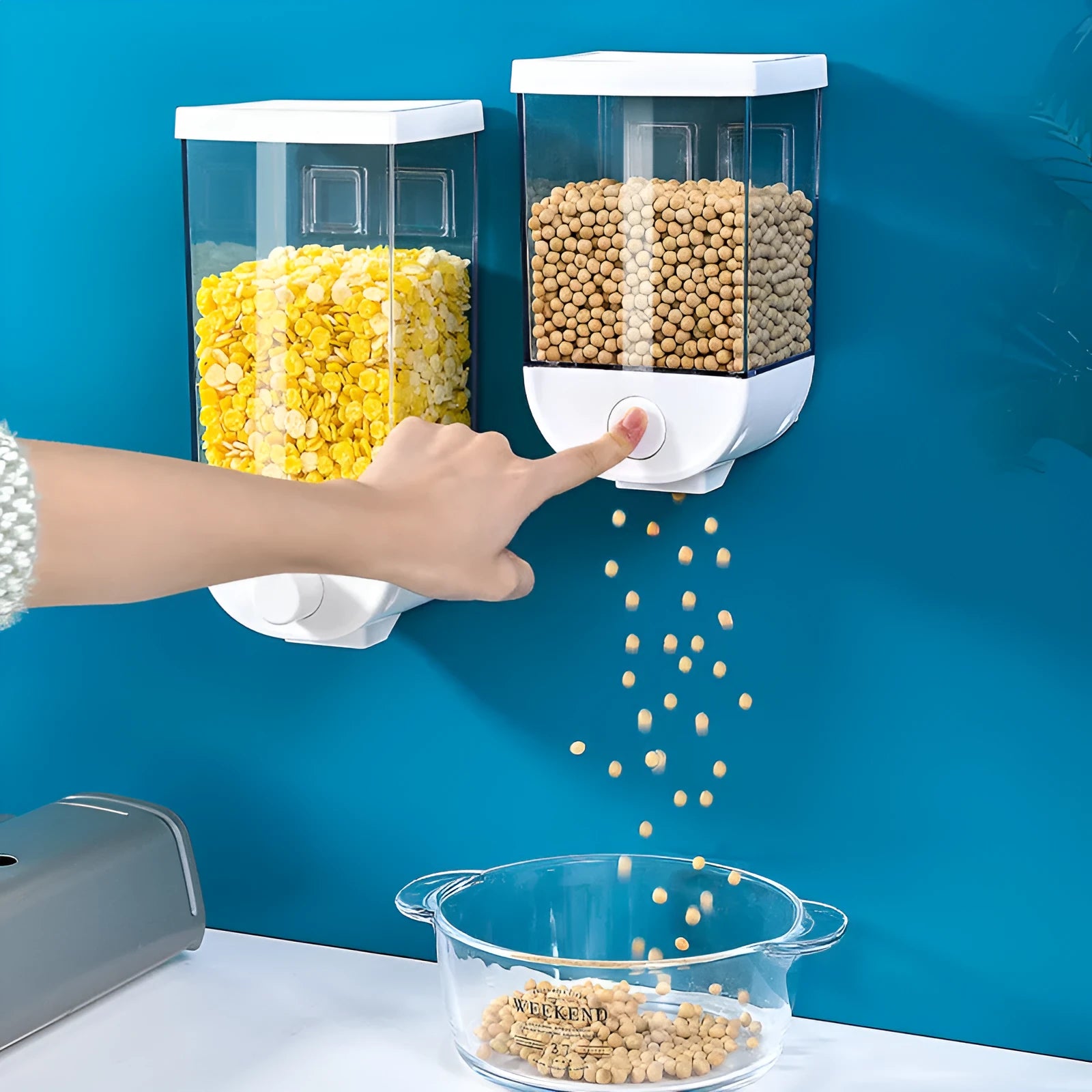 White wall-mounted transparent food storage box cereal dispenser on kitchen wall