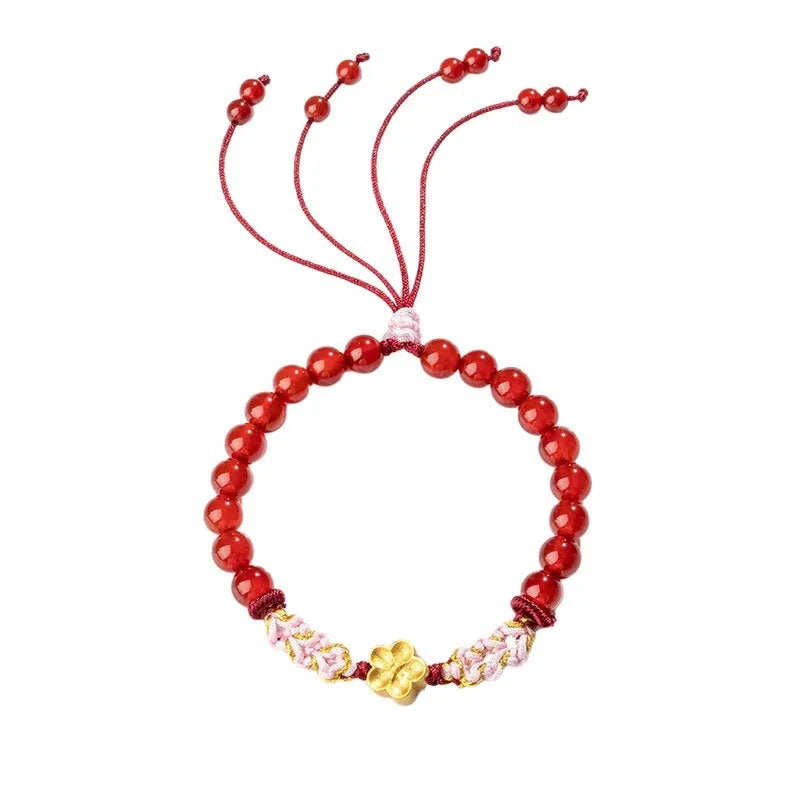 Hand-woven red rope bracelet with diamond-shaped crystal peach blossom charm in Chinese style