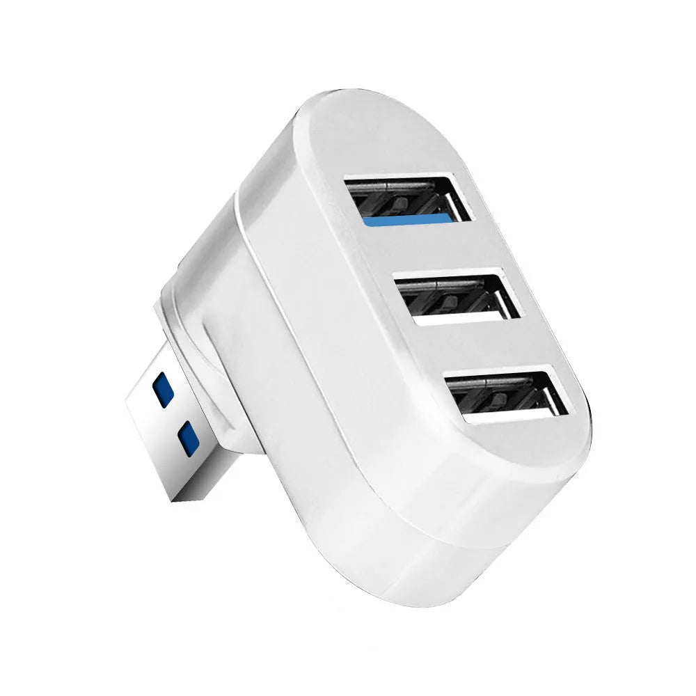 Black or white USB rotary splitter hub with four USB 3.0 ports on a desktop