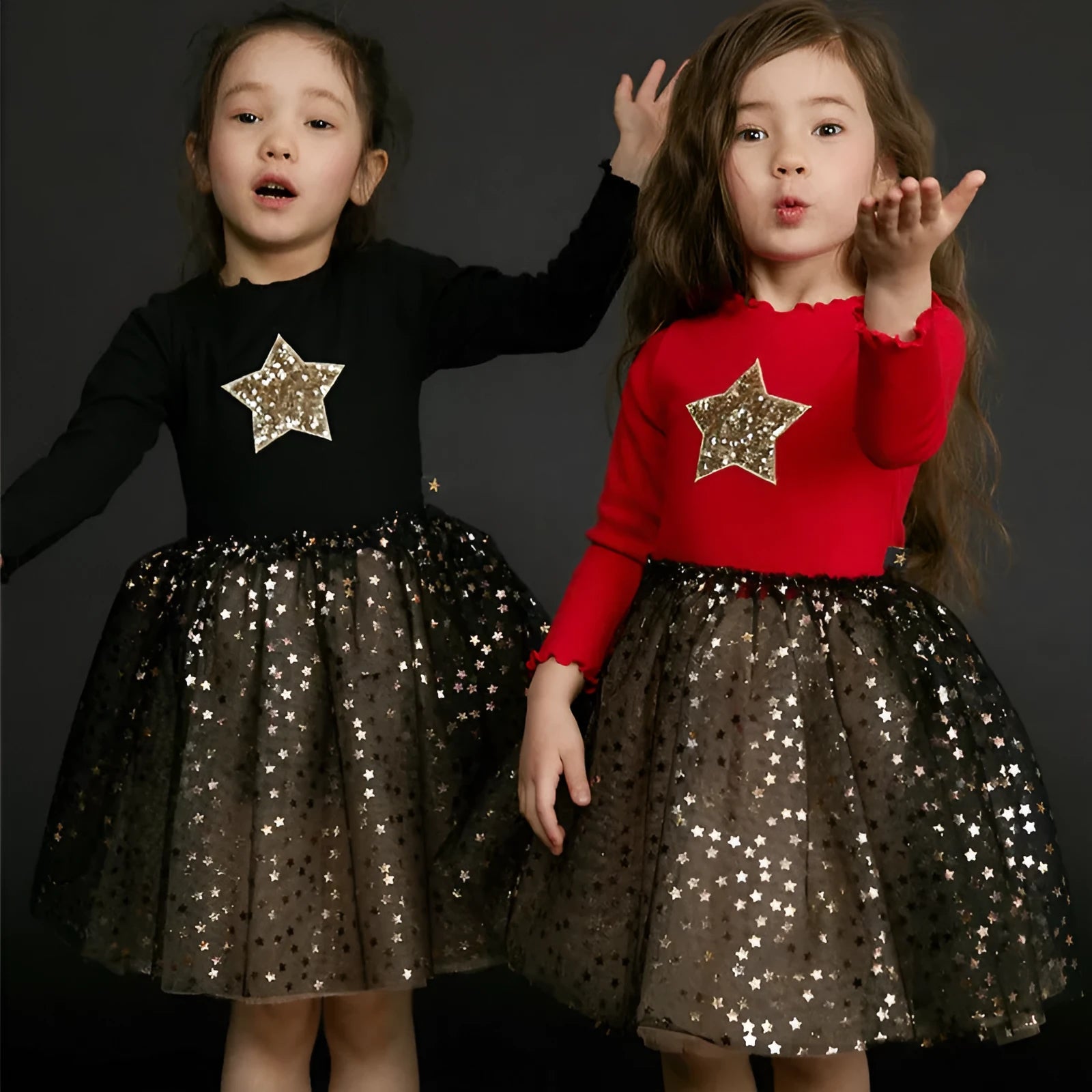 Red cotton long sleeve princess dress for a young girl with lace and bow details for Christmas.