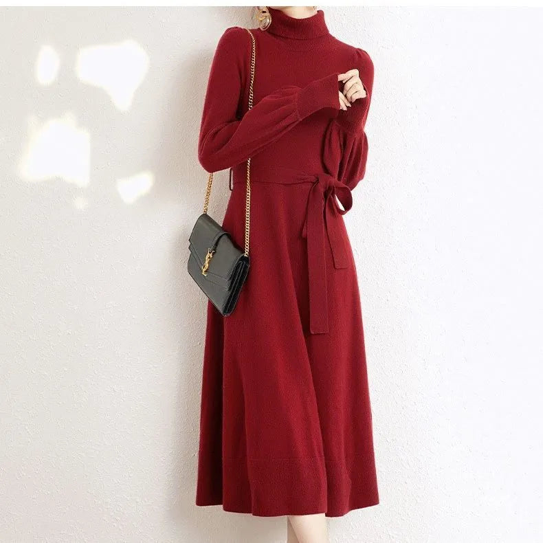 Ladies solid colour knit midi dress with turtleneck and elastic waist in rose red.