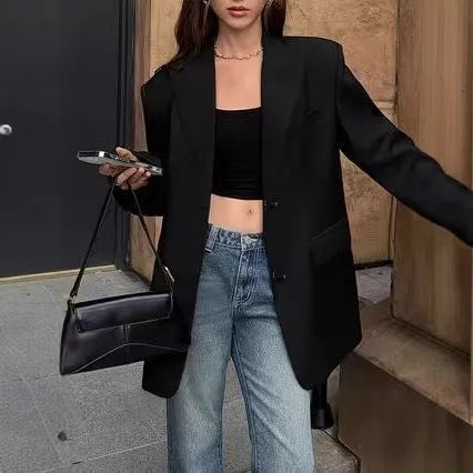 Retro loose black women's polyester suit jacket with pockets, front view, long sleeves, mid-length