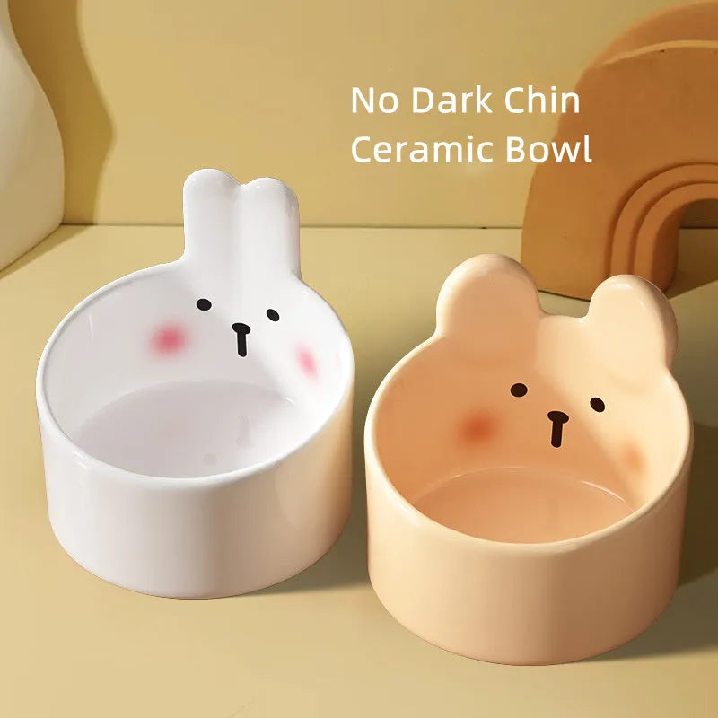 Ceramic pet feeding bowl set with neck protection design in white and brown animal patterns