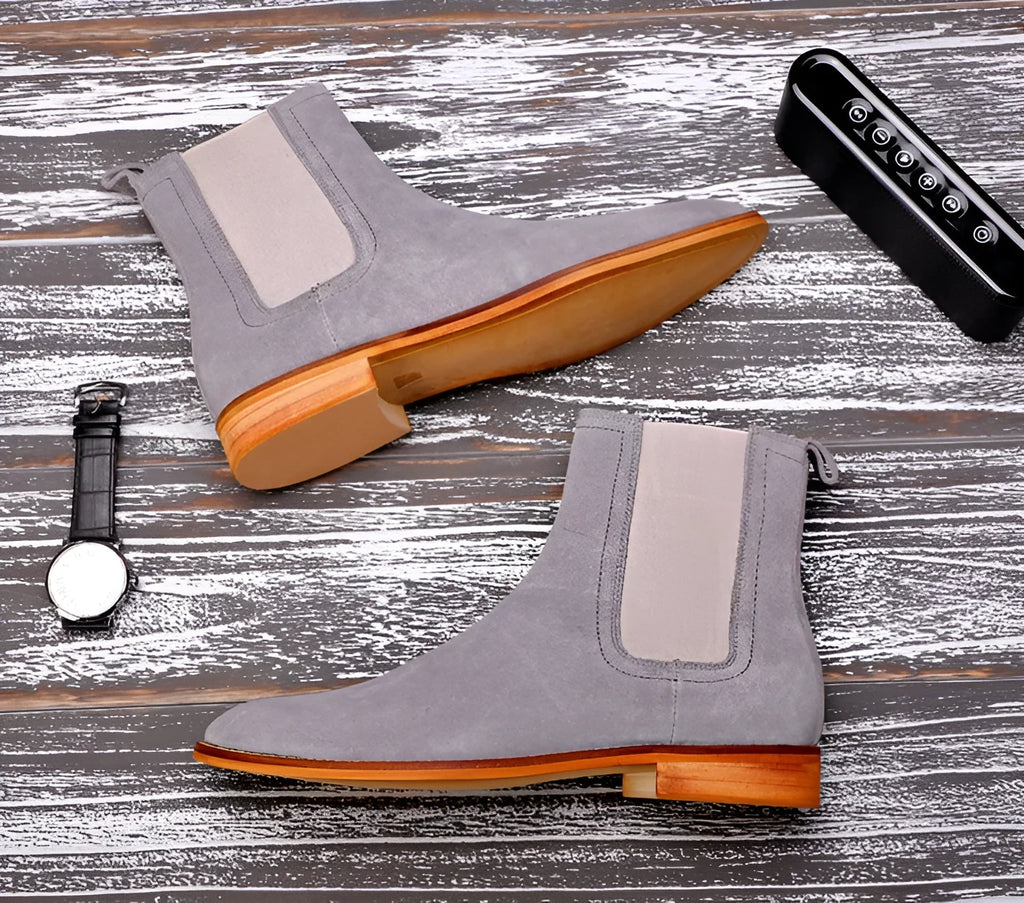 Chelsea boots in khaki, black, or grey leather with elastic side panels and heel pull tab, sizes 38 to 49