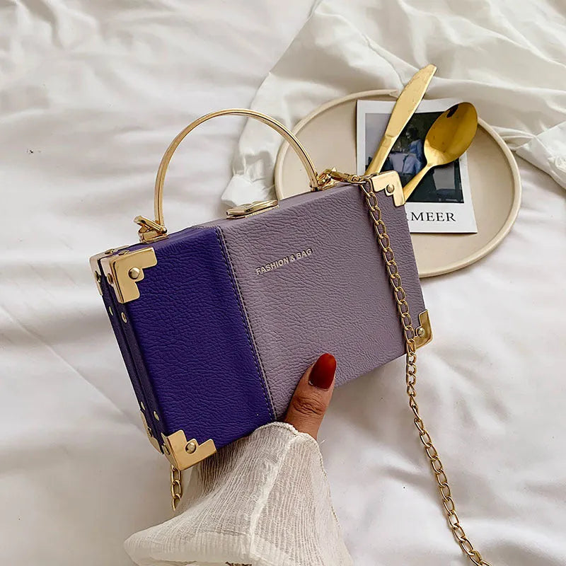 Ladies party clutch bag in orange with box handle and long chain, PU artificial leather, 19x5x12cm