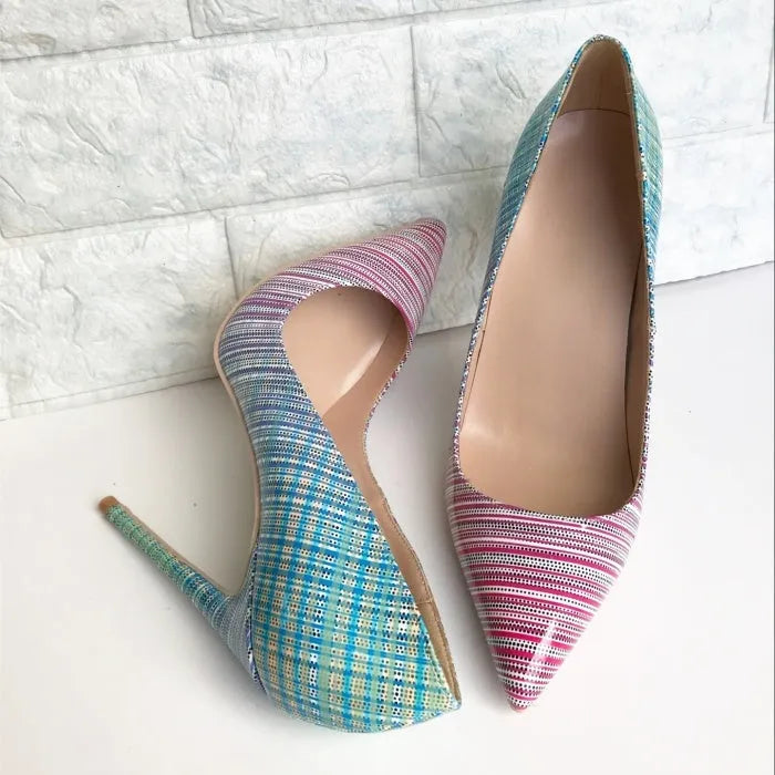 Women's pink and blue gradient patent leather pointed toe stiletto heels on a white background