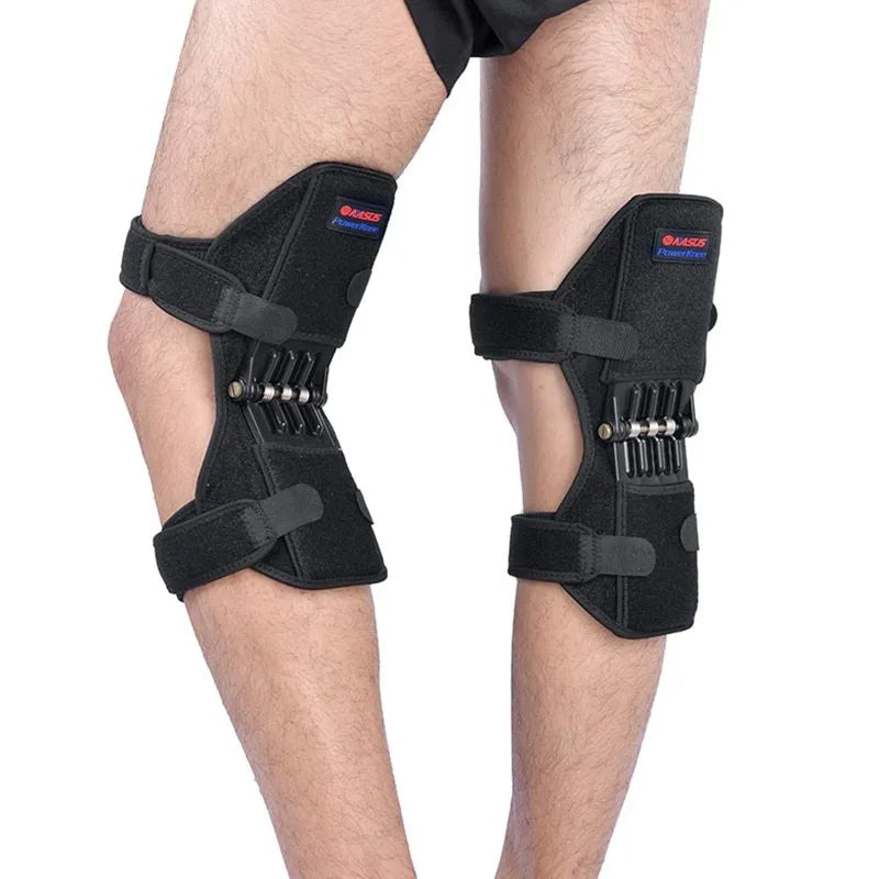 Black knee booster pair with carbon steel spring, adjustable Velcro straps, mesh ventilation and non-slip fabric, 29.5 x 28 x 27 cm