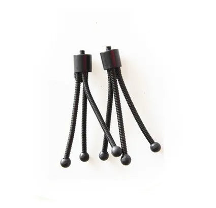 Small iron frame mini desktop tripod with folding legs and a ball head, shown alongside a camera.