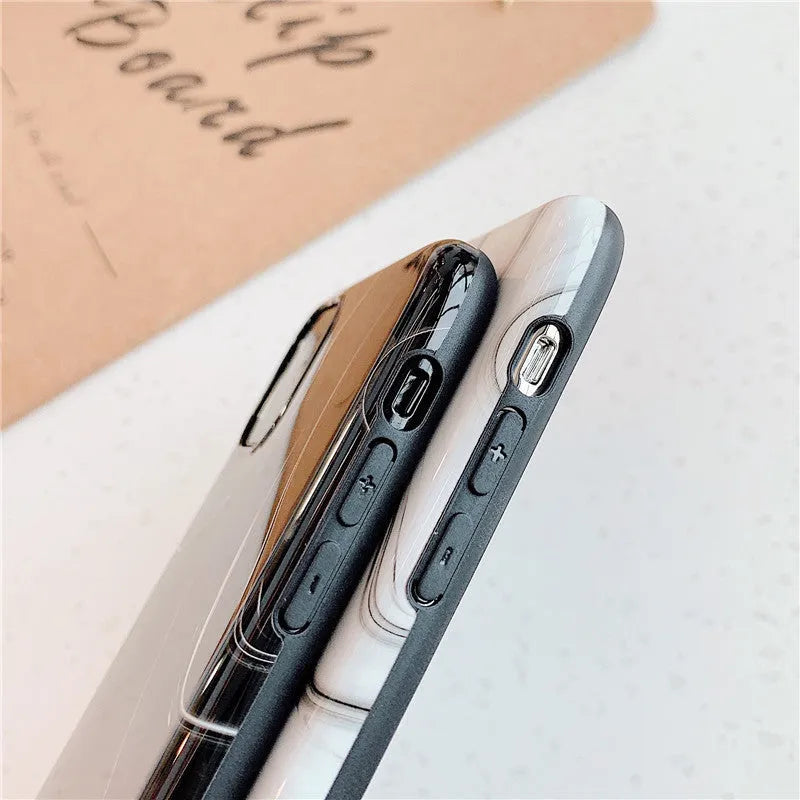 Marble mobile phone case for iPhone in black and white soft shell design, showing fade-resistant pattern