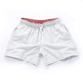 Men's plus size polyester beach shorts in black, showing straight leg opening.