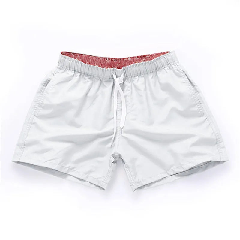 Men's plus size polyester beach shorts in black, showing straight leg opening.