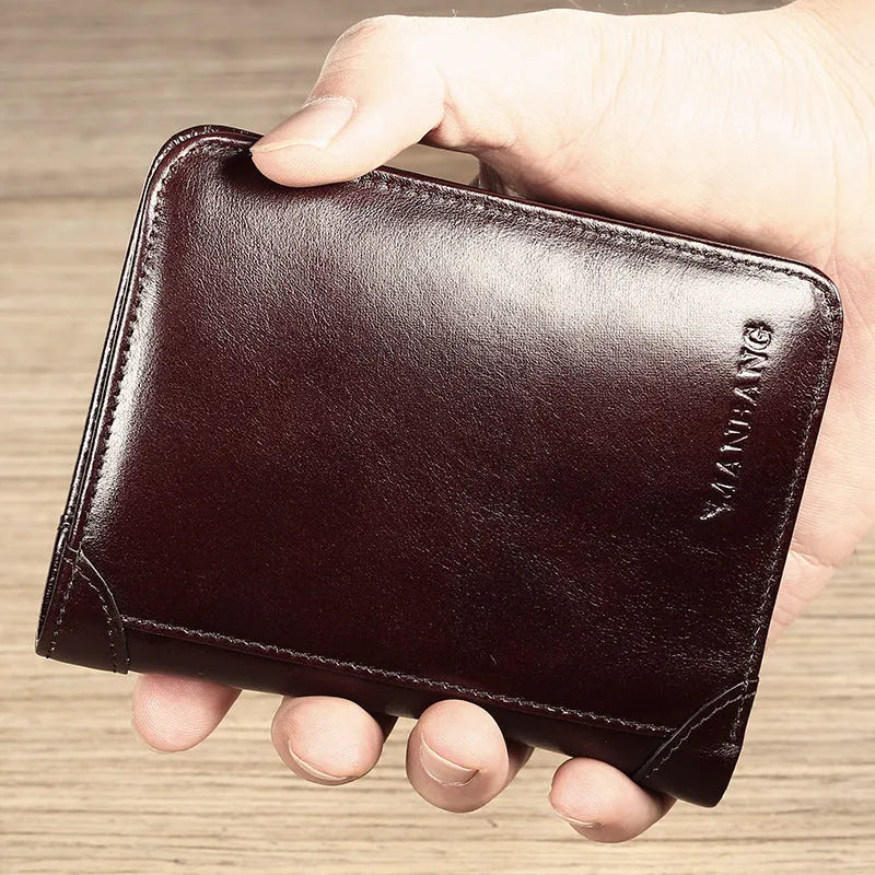 Men's brown leather bifold wallet open to show photo slot, card slots, billfold, and coin pocket.