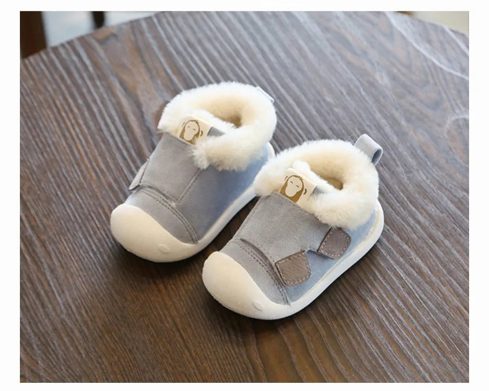 Children's velvet toddler shoes in various colours, showing non-slip sole and soft upper.
