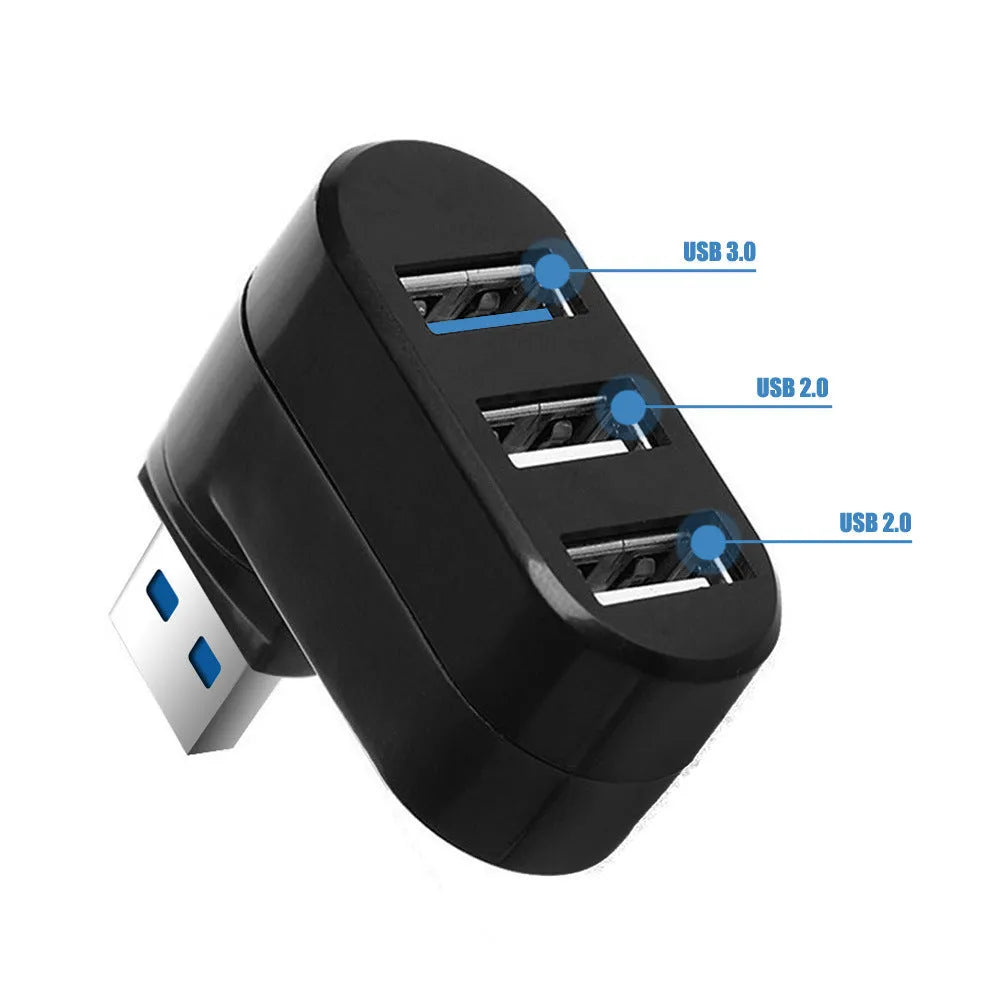 Black or white USB rotary splitter hub with four USB 3.0 ports on a desktop