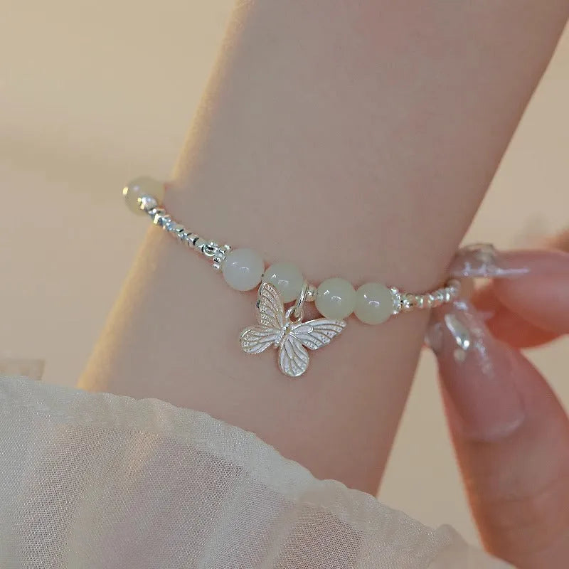 Hetian jade bracelet and necklace set for women with silver butterfly charms on electroplated copper chains