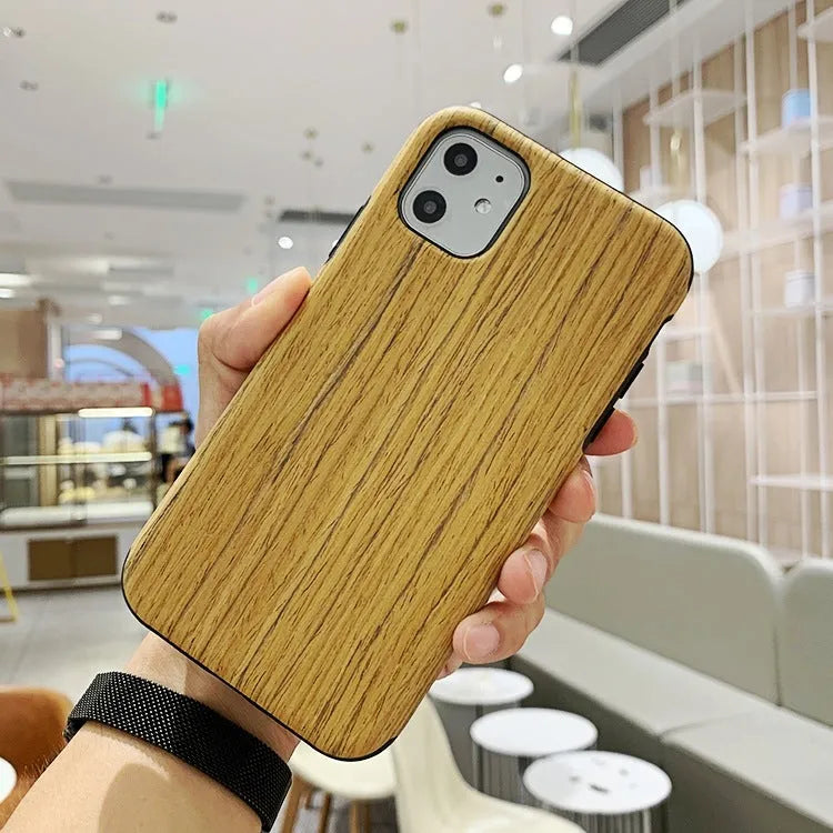 Wooden iPhone back cover case in rosewood, teak, black rose and walnut finishes.