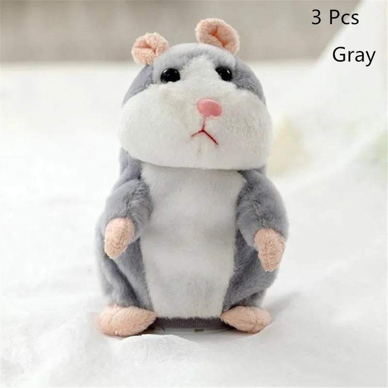 Small light brown plush hamster toy on a white background.