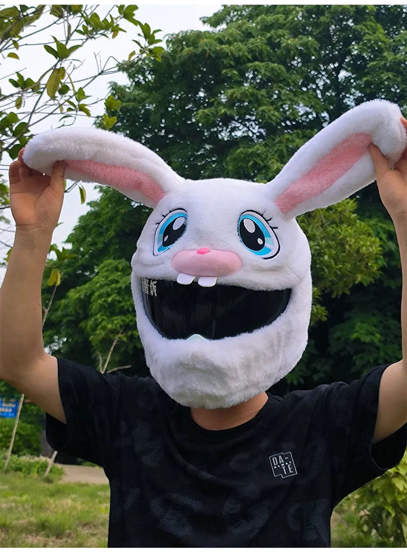 White decorative rabbit head cover for an electric motorcycle helmet with long ears and plush lining.