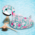 Inflatable pink flamingo swimming float and swim ring for adult and child pool use
