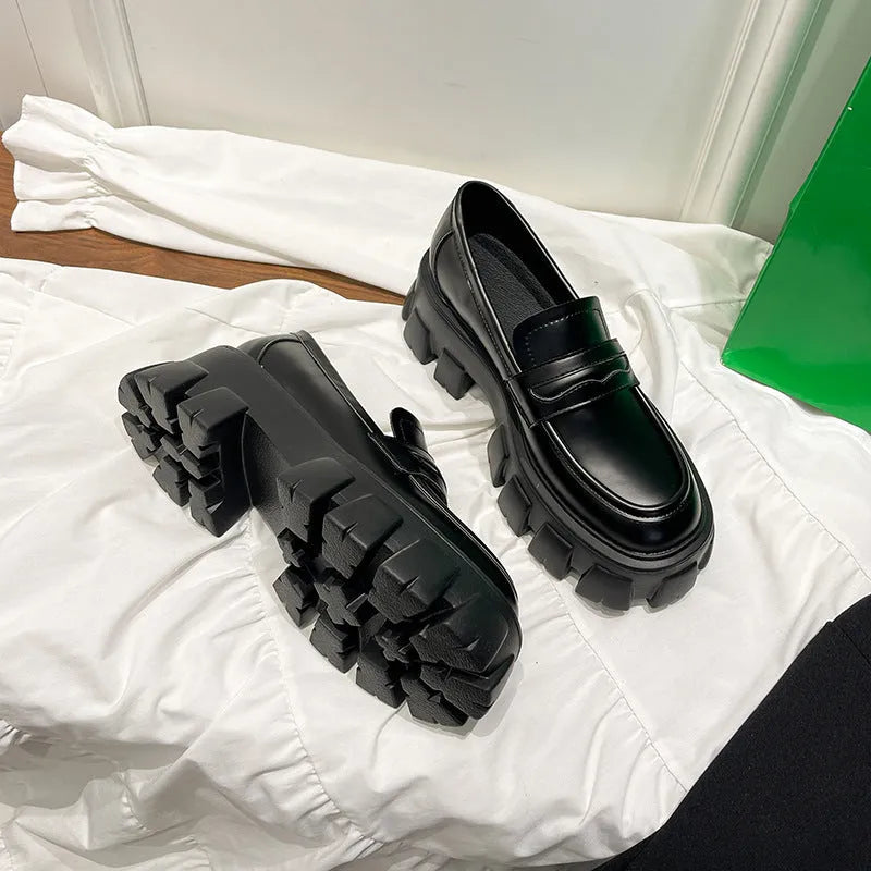 British style wide fit patent leather loafers with a rubber sole, shown in a matte finish.