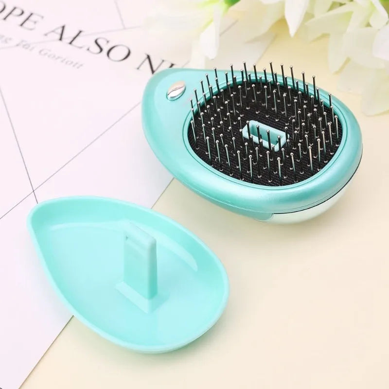 Pink electric ionic hair comb with ergonomic design on white background