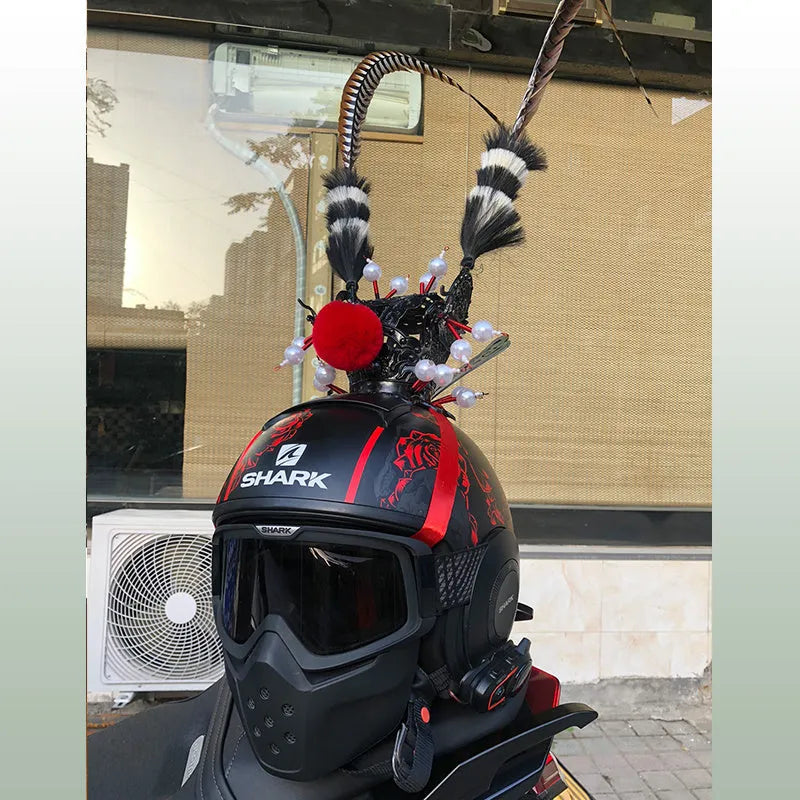 Zijin black crown and long feather decoration attached to a motorcycle helmet.