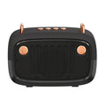 Compact portable Bluetooth speaker in black with USB port and control buttons
