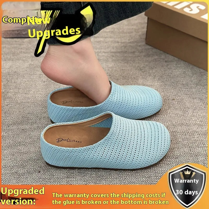 Women's blue cloth slippers with round toe and non-slip rubber sole, shown from the side.