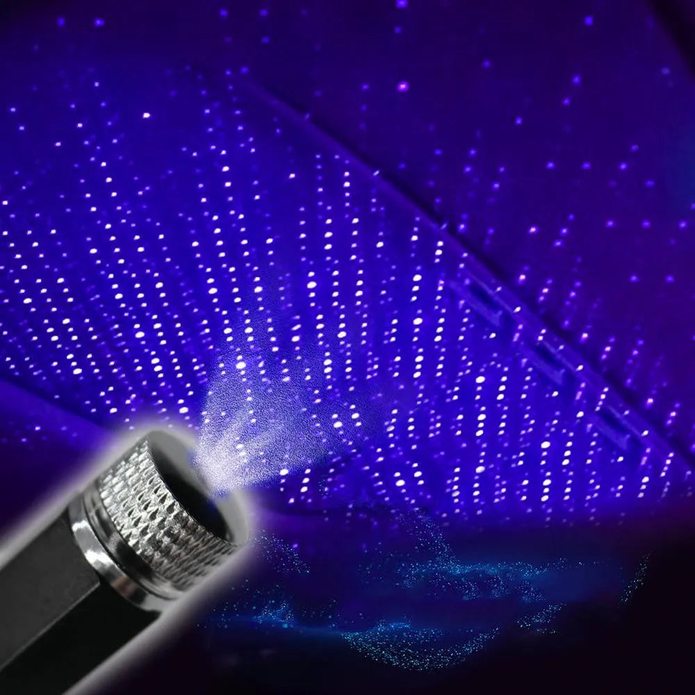 USB-powered car interior star light projecting purple starry sky pattern onto vehicle roof lining