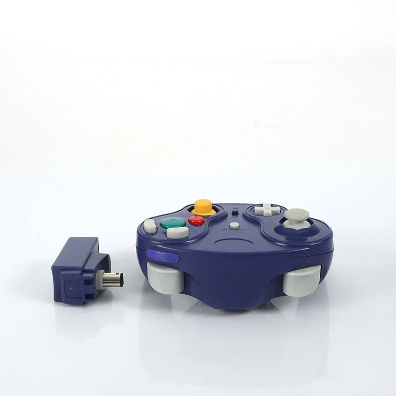 NGC 2.4G wireless game controller for Wii and GameCube in multiple colours on a white background.