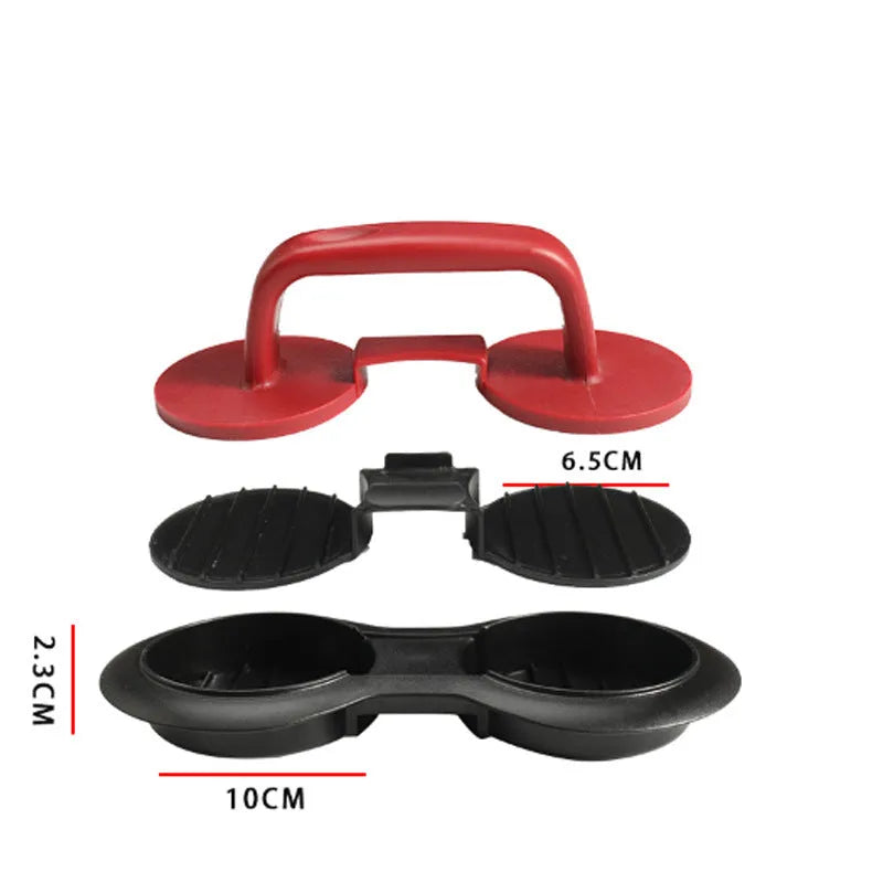 Black and red round burger press mould with oil paper liners on a kitchen counter.