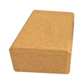 Yellow cork yoga brick with beveled edges and nonslip surface, size 24x16x8.5cm, on a plain background
