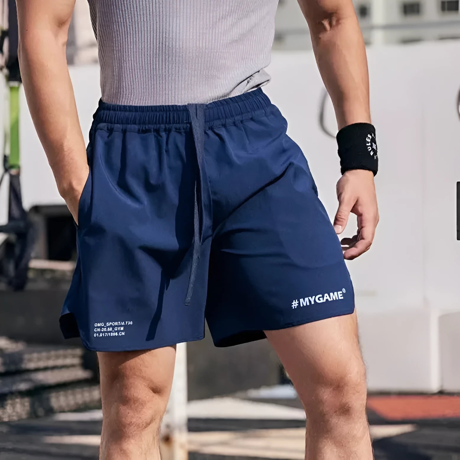 Men's grey quick-dry fitness shorts with high elasticity for summer training workouts.