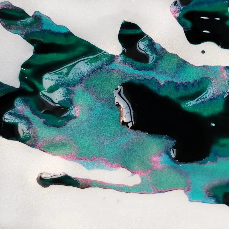 Sheen gradient fountain pen ink bottle with gold powder particles in Red Tide and Truffle colours