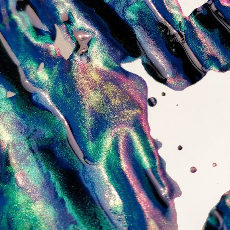 Sheen gradient fountain pen ink bottle with gold powder particles in Red Tide and Truffle colours